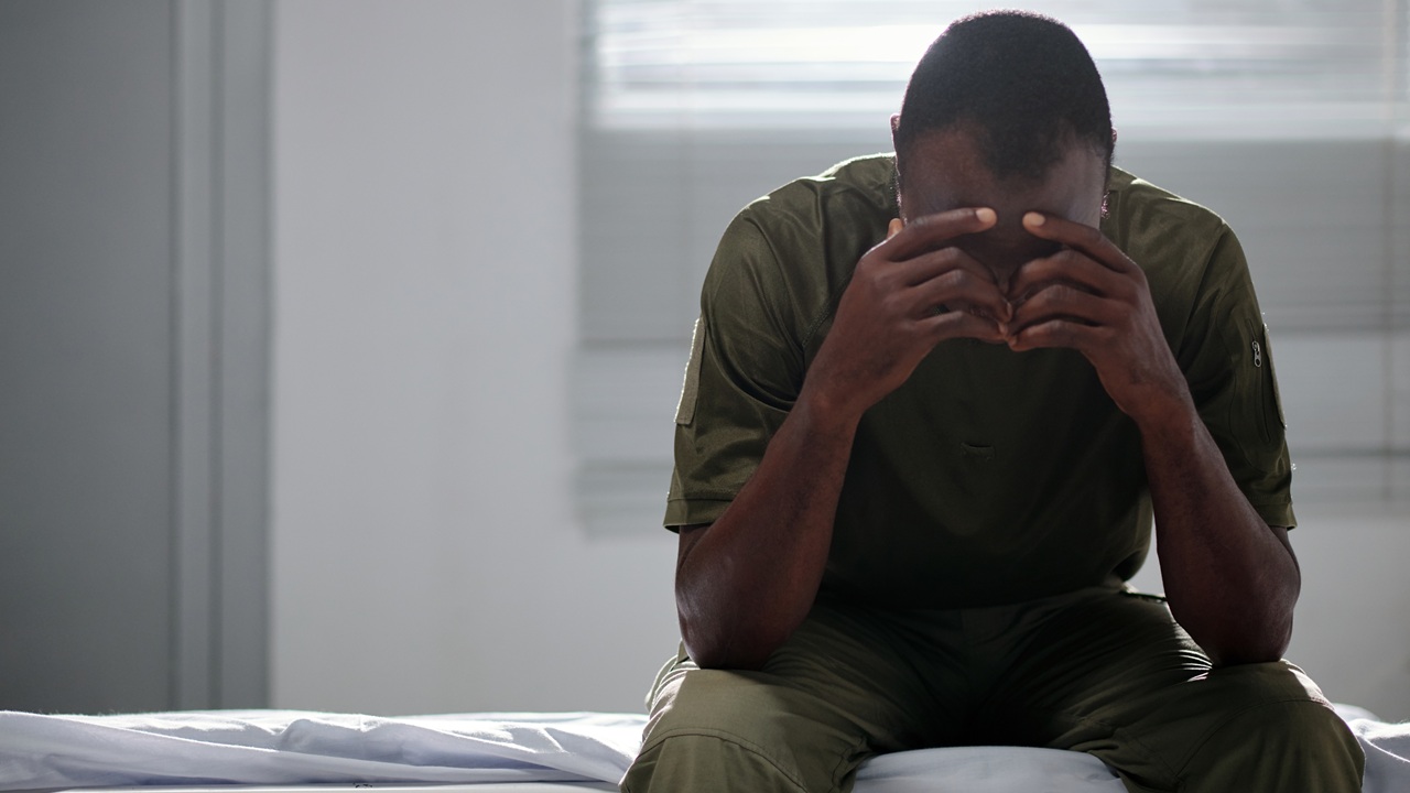 Soldier in depression sitting in hospital