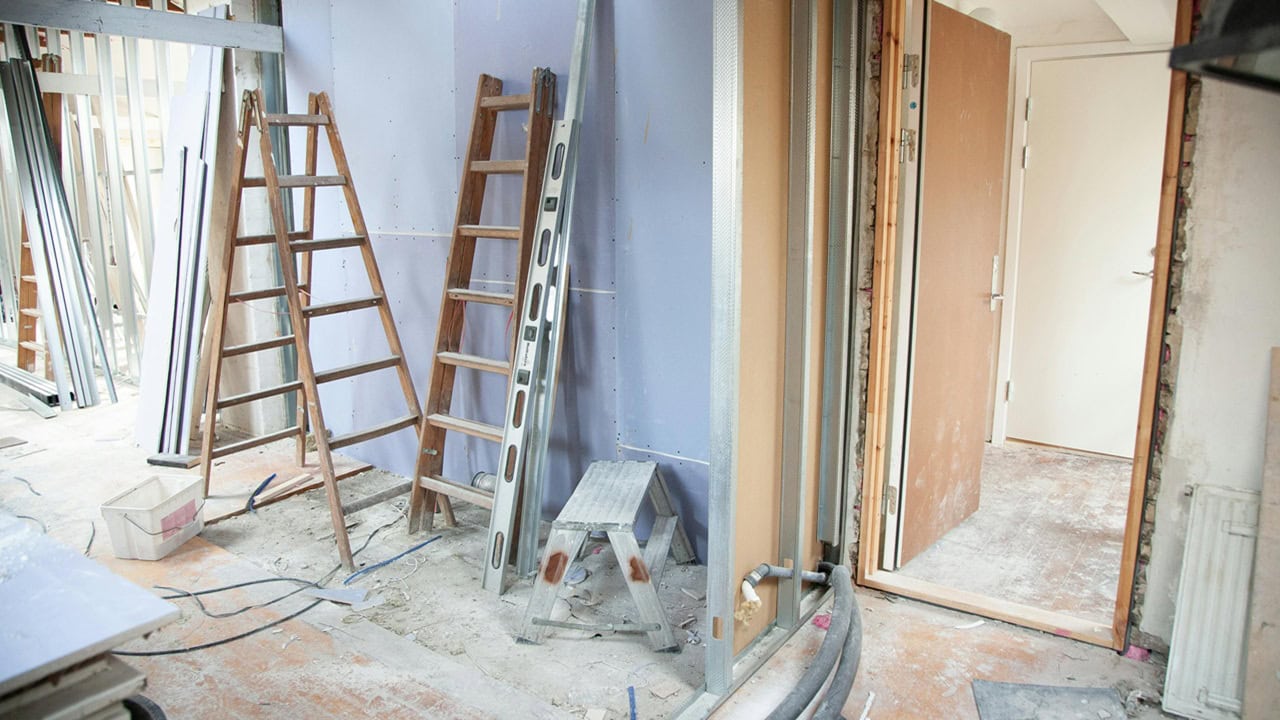 Immune System Recovery Aid: Why Professional Post Renovation Cleaning Service Singapore Supports Healing Construction and home improvement site with ladders, tools, and framing materials.